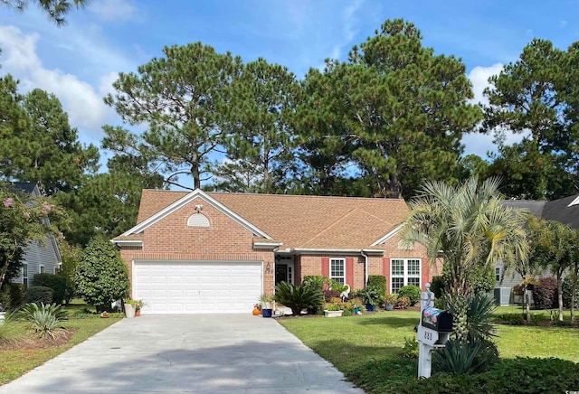 single story home with a front yard and a garage