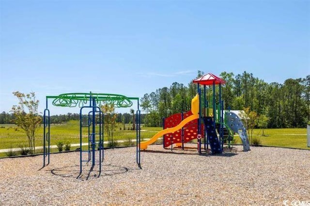 community playground featuring a yard