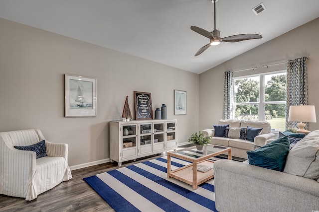 living room featuring lofted ceiling, dark hardwood / wood-style flooring, and ceiling fan