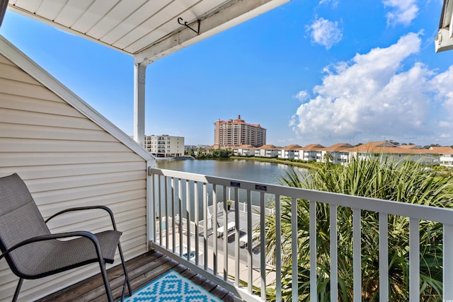 balcony featuring a water view