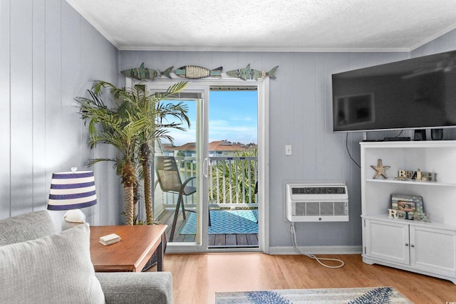 1919 Spring St Unit B-31, North Myrtle Beach, SC 29582 - doorway to outside with wood finished floors, a wall mounted AC, ornamental molding, wooden walls, and a textured ceiling