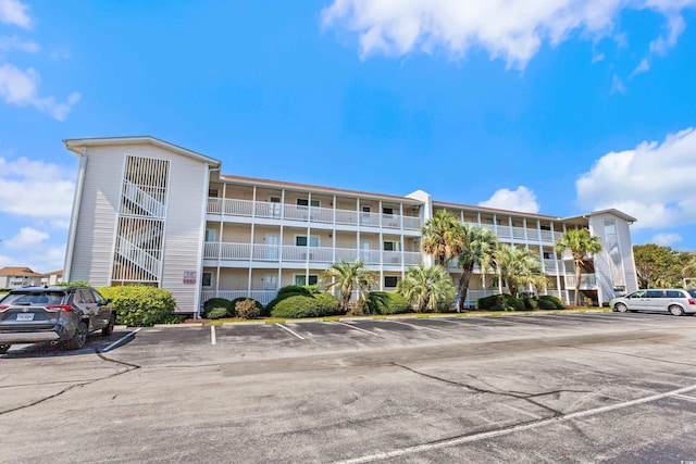 1919 Spring St Unit B-31, North Myrtle Beach, SC 29582 - view of apartment building / complex featuring uncovered parking