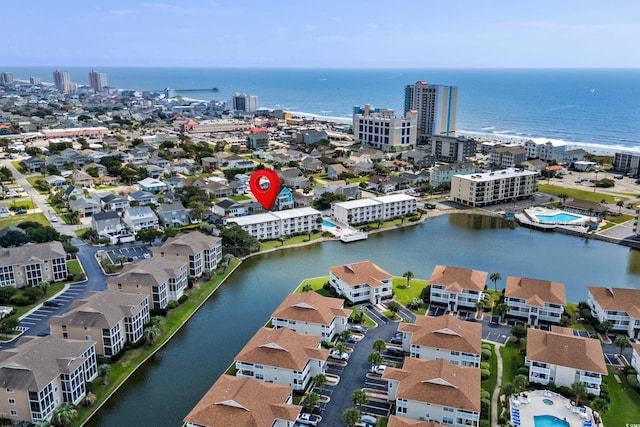 drone / aerial view featuring a water view