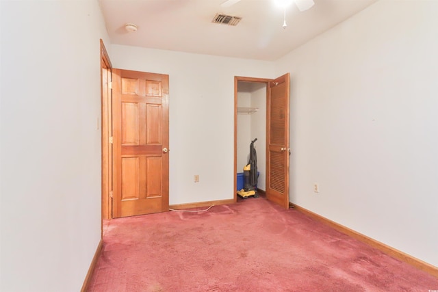 unfurnished bedroom with carpet flooring and ceiling fan