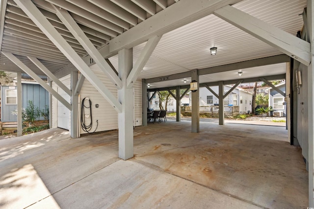 garage featuring a carport