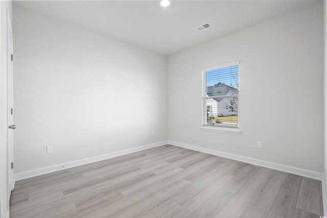 623 Blackthorne Cir NW, Calabash, NC 28467 - spare room with light wood-style flooring and recessed lighting