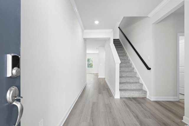 623 Blackthorne Cir NW, Calabash, NC 28467 - entrance foyer with crown molding, wood finished floors, stairway, and recessed lighting