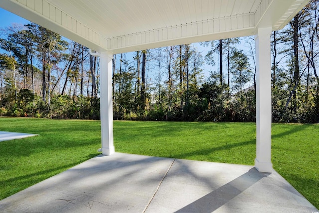 623 Blackthorne Cir NW, Calabash, NC 28467 - view of patio / terrace featuring view of scattered trees