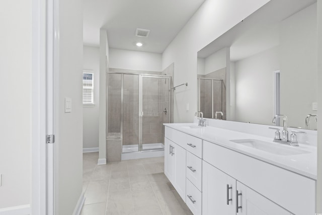 623 Blackthorne Cir NW, Calabash, NC 28467 - full bathroom with double vanity, a stall shower, recessed lighting, and tile patterned flooring