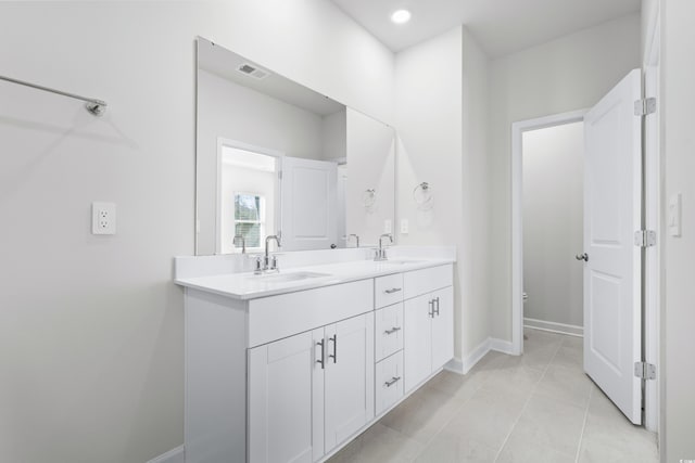 623 Blackthorne Cir NW, Calabash, NC 28467 - full bathroom with double vanity and tile patterned floors