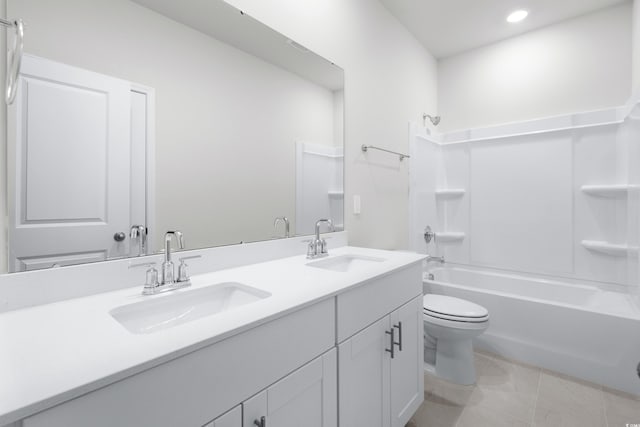 623 Blackthorne Cir NW, Calabash, NC 28467 - bathroom featuring double vanity, washtub / shower combination, recessed lighting, and tile patterned flooring