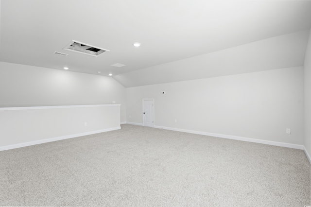 623 Blackthorne Cir NW, Calabash, NC 28467 - additional living space featuring vaulted ceiling, light carpet, and recessed lighting