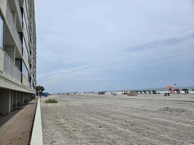 exterior space featuring a view of the beach