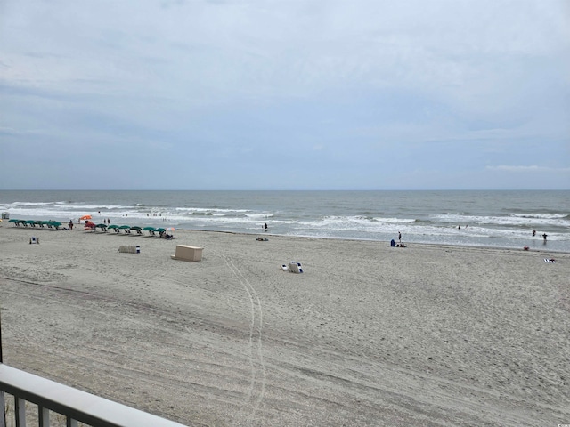 view of water feature with a beach view