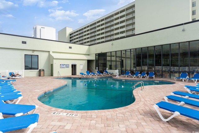 view of pool with a patio