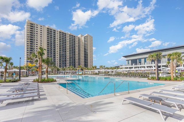 view of swimming pool with a patio area