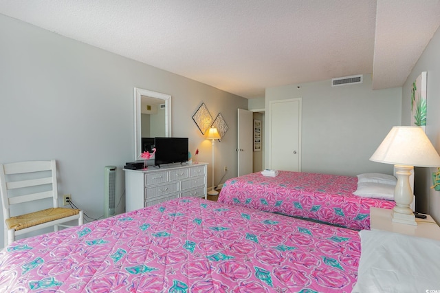 bedroom with a textured ceiling