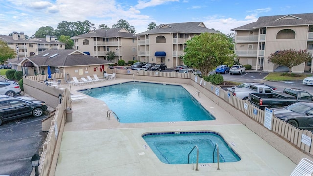 view of pool featuring a patio