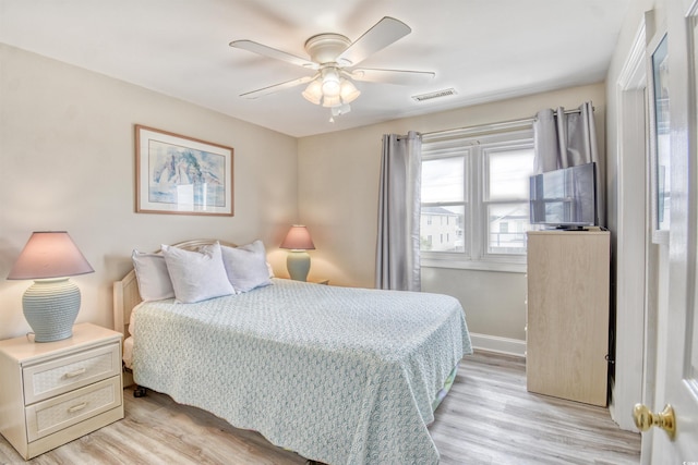 bedroom featuring ceiling fan and light wood-type flooring