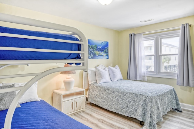 bedroom featuring hardwood / wood-style flooring