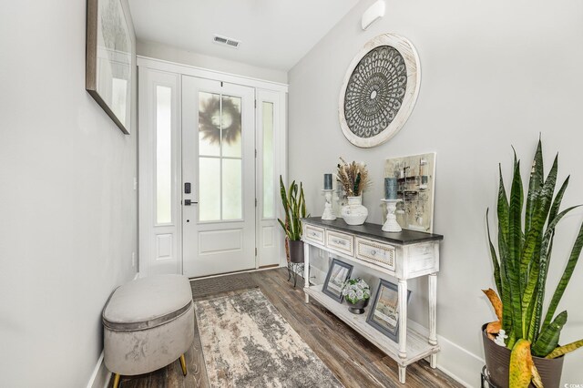 1886 Southwood Dr, Myrtle Beach, SC 29575 - entrance foyer featuring dark wood-style flooring, visible vents, and baseboards