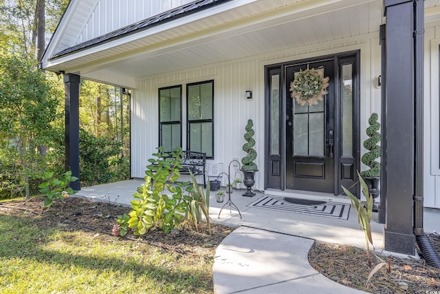 1886 Southwood Dr, Myrtle Beach, SC 29575 - view of exterior entry with a porch