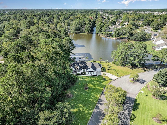 drone / aerial view with a water view