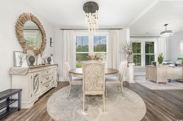 1886 Southwood Dr, Myrtle Beach, SC 29575 - dining space with baseboards, a notable chandelier, and wood finished floors