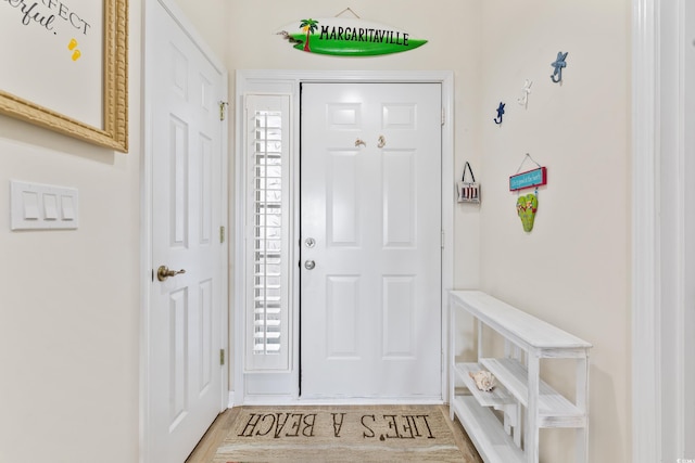 entrance foyer with light hardwood / wood-style flooring