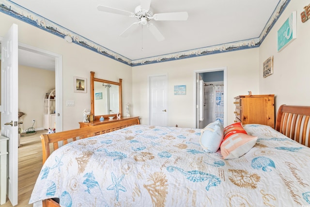 bedroom with wood-type flooring and ceiling fan