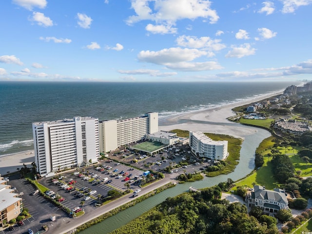 bird's eye view featuring a water view and a view of the beach