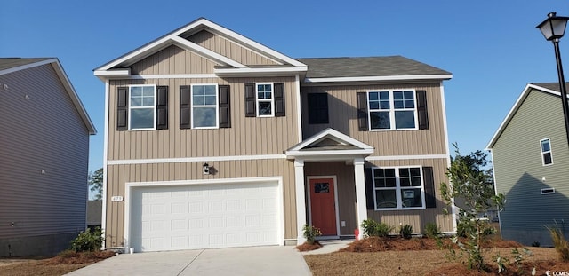 craftsman-style home with a garage