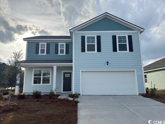 view of front property with a garage