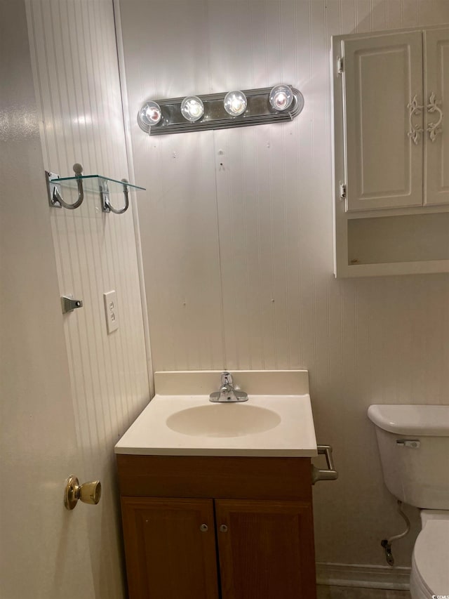 bathroom with vanity and toilet