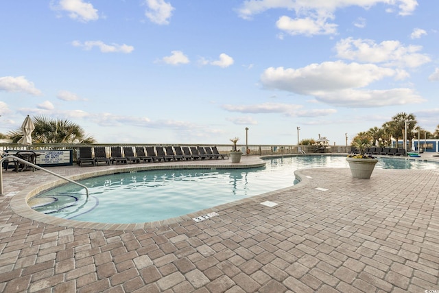 view of pool featuring a patio area