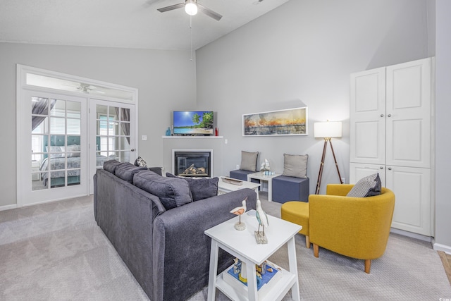 9772 Leyland Dr Unit 9772-9, Myrtle Beach, SC 29572 - living room with ceiling fan, light carpet, a glass covered fireplace, high vaulted ceiling, and baseboards