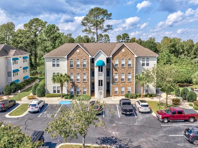 9772 Leyland Dr Unit 9772-9, Myrtle Beach, SC 29572 - view of building exterior with uncovered parking
