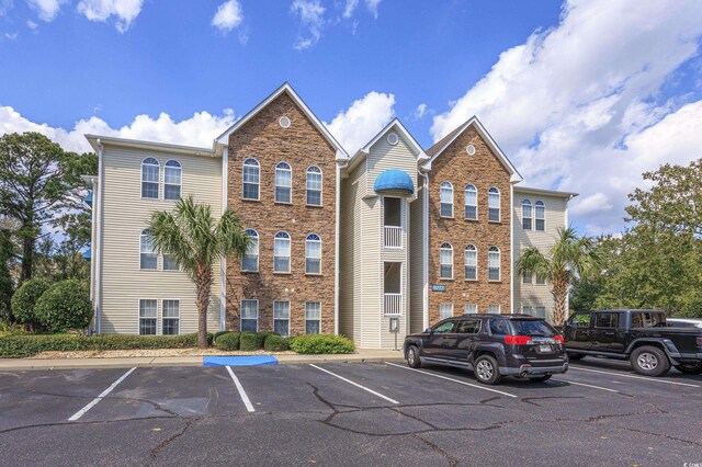 9772 Leyland Dr Unit 9772-9, Myrtle Beach, SC 29572 - view of building exterior featuring uncovered parking