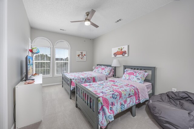 9772 Leyland Dr Unit 9772-9, Myrtle Beach, SC 29572 - bedroom featuring carpet flooring, a textured ceiling, a ceiling fan, and baseboards