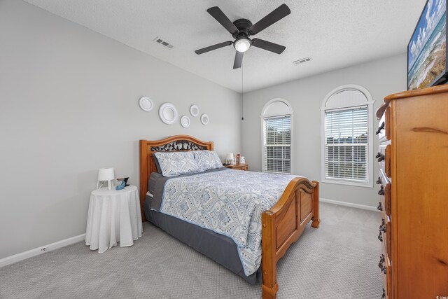 9772 Leyland Dr Unit 9772-9, Myrtle Beach, SC 29572 - carpeted bedroom with baseboards, a textured ceiling, and a ceiling fan
