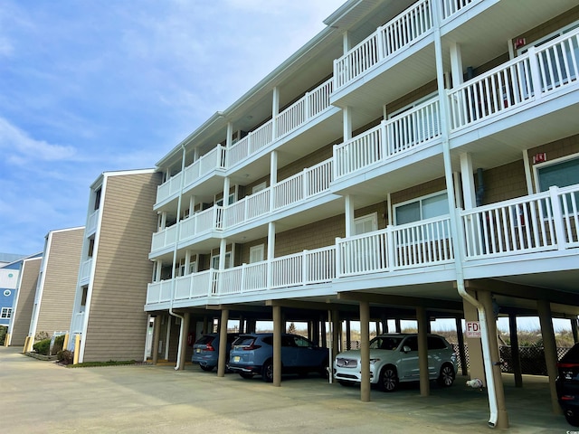 view of property with covered parking