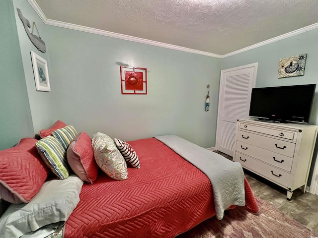 bedroom featuring a textured ceiling and ornamental molding