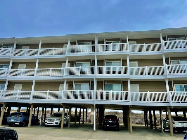 view of property with covered parking