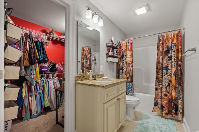 full bathroom featuring shower / bath combination with curtain, vanity, and toilet