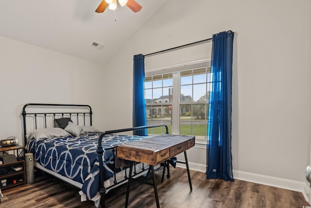 bedroom with ceiling fan, dark hardwood / wood-style floors, and high vaulted ceiling