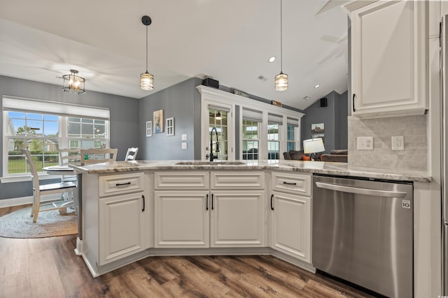 kitchen featuring dark wood-type flooring, sink, kitchen peninsula, stainless steel dishwasher, and white cabinetry