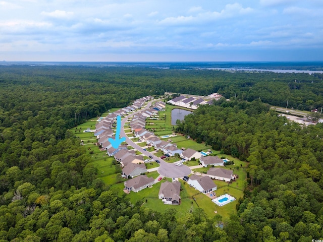 bird's eye view with a residential view and a view of trees