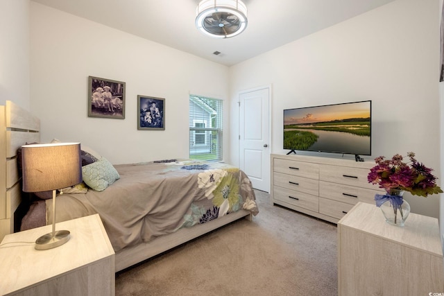 bedroom with carpet and visible vents