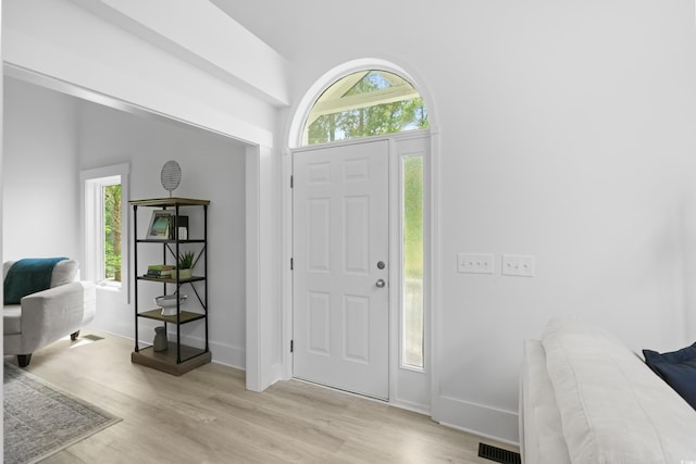 foyer with light wood-type flooring