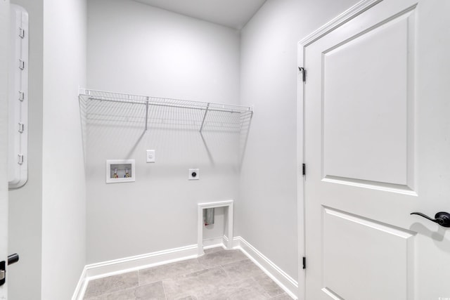 laundry room featuring washer hookup, hookup for an electric dryer, and light tile patterned floors